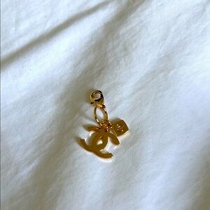 CHANEL Gold Logo Brooch
